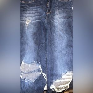 Super distressed dark denim